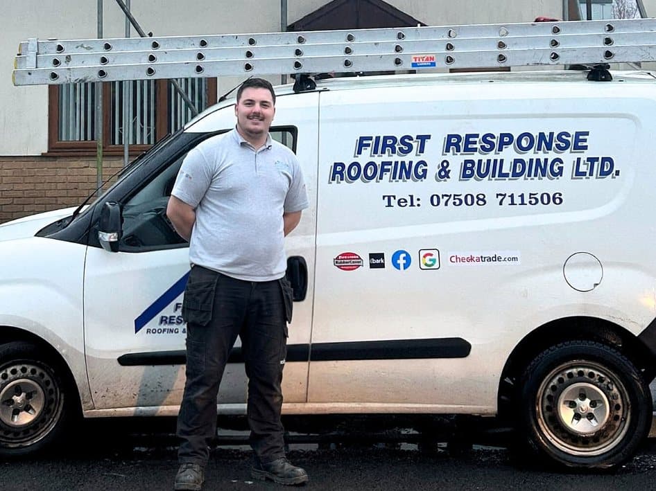 Sammy Lee standing in front of his First Response Roofing van